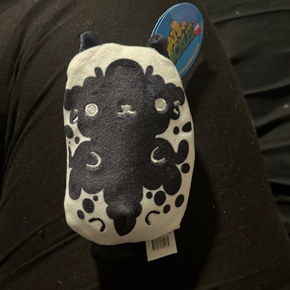 Ink spot, cat, cats versus pickles bean